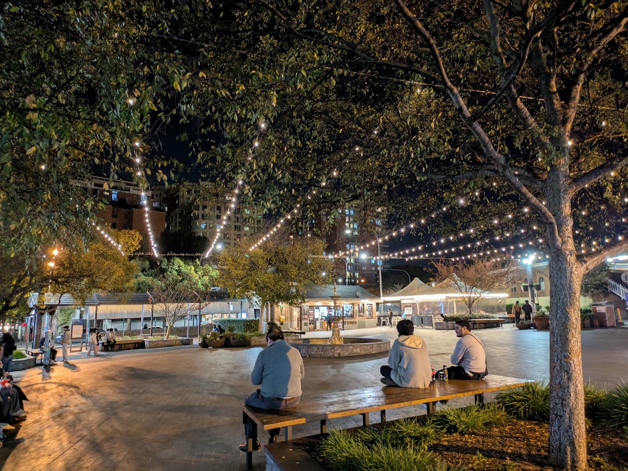 Strathfield Plaza illuminated in the evening.
